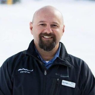 Micahel Fanning from the ski resort Perrisher Blue looking headon and smiling.