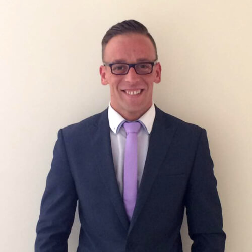 Vincent Connolly from RSP Recruitment, wearing a suit and smiling.